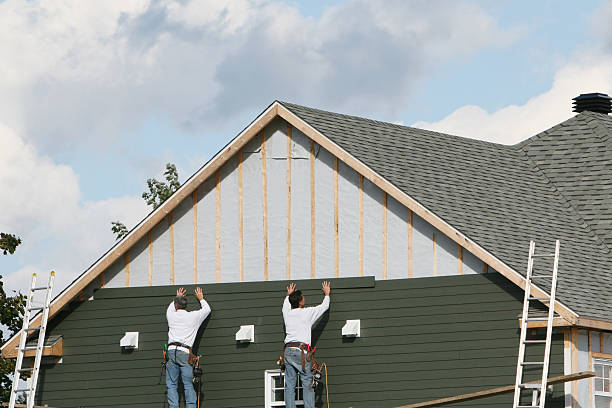 Professional Storm Damage Siding Repair technician working in Clark, NJ